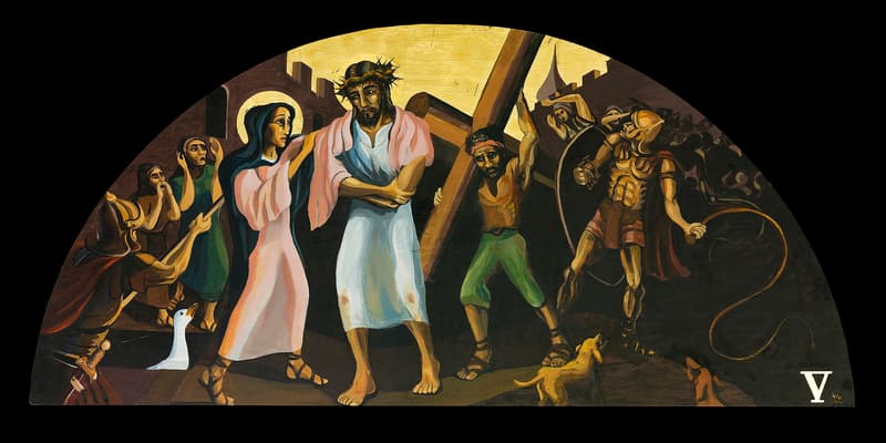 Simon helps Jesus carry his cross